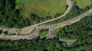 AX110_143 - 5.5K aerial stock footage of a bird's eye view of a highway roundabout, Bowling, Scotland