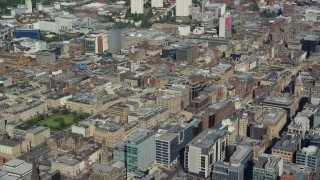 AX110_158 - 5.5K aerial stock footage of city office buildings, Glasgow, Scotland