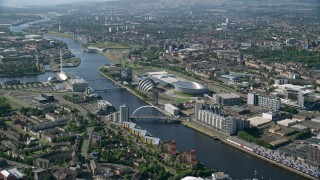 AX110_169 - 5.5K stock footage aerial video of Scotland's National Arena and Clyde Auditorium along River Clyde, Glasgow, Scotland