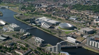 AX110_171 - 5.5K aerial stock footage of Scotland's National Arena and Clyde Auditorium across River Clyde, Glasgow, Scotland