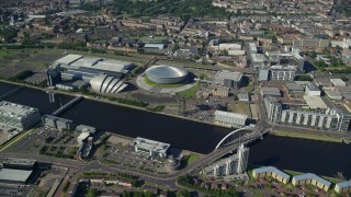 AX110_172 - 5.5K aerial stock footage of Scotland's National Arena and Clyde Auditorium beside the River Clyde, Glasgow, Scotland