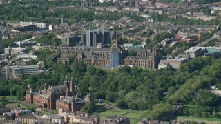 AX110_173 - 5.5K stock footage aerial video of the University of Glasgow and Kelvingrove Art Gallery and Museum, Scotland
