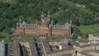 AX110_176E - 5.5K aerial stock footage of Kelvingrove Art Gallery and Museum, Glasgow, Scotland
