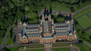 AX110_178 - 5.5K aerial stock footage of bird's eye of Kelvingrove Art Gallery and Museum, Glasgow, Scotland
