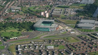 AX110_185 - 5.5K aerial stock footage approach Celtic Park Stadium, Glasgow, Scotland
