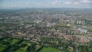 AX110_195 - 5.5K stock footage aerial video of a wide view of the city of Glasgow, Scotland