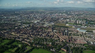 AX110_195E - 5.5K aerial stock footage of a wide view of Glasgow, Scotland