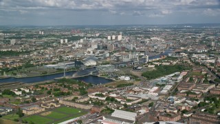AX110_202 - 5.5K stock footage aerial video of the River Clyde and the city of Glasgow, Scotland