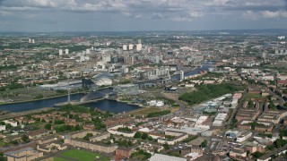 AX110_203 - 5.5K stock footage aerial video approach River Clyde near Glasgow Science Centre, Glasgow, Scotland