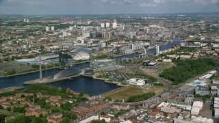 AX110_204 - 5.5K stock footage aerial video approach River Clyde, arena and concert hall, Glasgow, Scotland