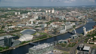 AX110_206 - 5.5K stock footage aerial video of River Clyde, arena, concert hall in Glasgow, Scotland