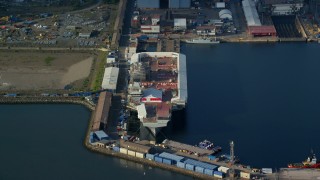 AX111_059 - 5.5K aerial stock footage aircraft carrier at Rosyth Dockyard on Firth of Forth, Scotland