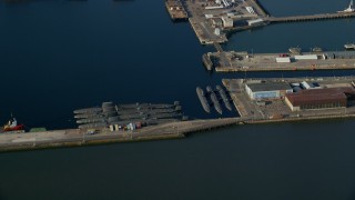 AX111_060 - 5.5K aerial stock footage of submarines at Rosyth Dockyard on Firth of Forth, Scotland