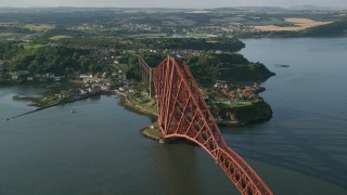 AX111_069 - 5.5K aerial stock footage of orbiting Forth Bridge on Firth of Forth, North Queensferry, Scotland