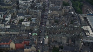 AX111_133E - 5.5K aerial stock footage fly over historic Edinburgh Castle, Scotland