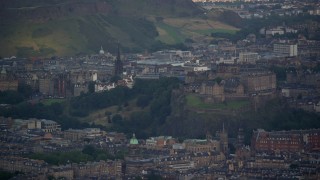 AX111_154 - 5.5K aerial stock footage of iconic Edinburgh Castle and cityscape, Scotland