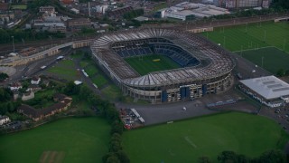 AX111_165 - 5.5K aerial stock footage of orbiting Murrayfield Stadium, a rugby stadium in Edinburgh, Scotland
