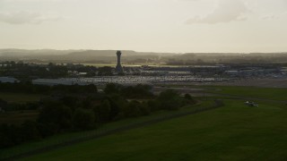 AX111_169 - 5.5K aerial stock footage of Edinburgh Airport and control tower, Scotland