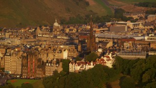 AX112_033 - 5.5K aerial stock footage of The Hub cathedral, Edinburgh, Scotland at sunset