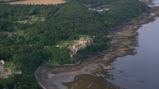 AX113_054 - 5.5K aerial stock footage of Culzean Castle beside Firth of Clyde, Maybole, Scotland