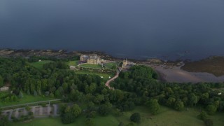 AX113_056 - 5.5K aerial stock footage of orbiting Culzean Castle by Firth of Clyde, Maybole, Scotland