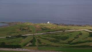 AX113_061 - 5.5K aerial stock footage of Turnberry Golf Course overlooking the Firth of Clyde, Scotland