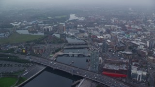AX113_087 - 5.5K aerial stock footage of bridges over River Lagan, Belfast, Northern Ireland