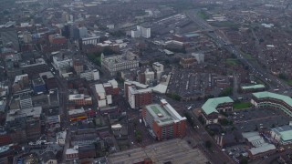AX113_090E - 5.5K aerial stock footage orbit city streets and office buildings, Belfast, Northern Ireland