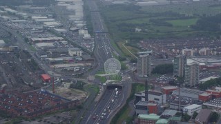 AX113_093E - 5.5K aerial stock footage of the Rise sculpture and M1 Freeway, Belfast, Northern Ireland