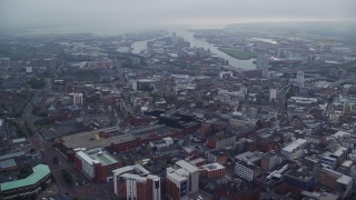 AX113_104E - 5.5K aerial stock footage of Port of Belfast and River Lagan bridges, Northern Ireland