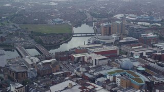 AX113_117 - 5.5K aerial stock footage of shopping center and bridges over River Lagan, Belfast, Northern Ireland