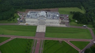 AX113_126 - 5.5K aerial stock footage of orbiting Parliament Buildings and the grounds around it, Belfast, Northern Ireland