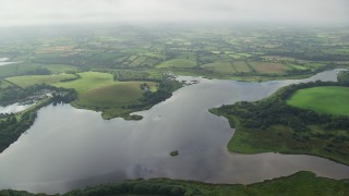 AX113_159 - 5.5K aerial stock footage of farms on the shoes of Strangford Lough, Downpatrick, Northern Ireland