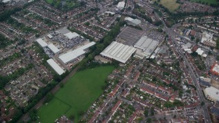 AX114_007 - 5.5K aerial stock footage fly over residential neighborhoods and a shopping center, Croydon, England