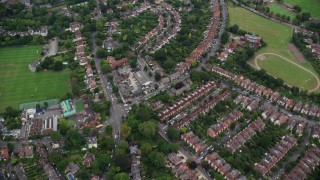 AX114_018 - 5.5K aerial stock footage of flying over residential neighborhoods, London, England