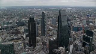 AX114_025 - 5.5K aerial stock footage of tall skyscrapers and vast cityscape, Central London, England