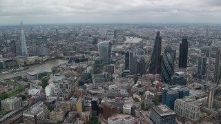 AX114_032 - 5.5K aerial stock footage of River Thames between skyscrapers and The Shard, Central London, England