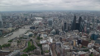 AX114_034 - 5.5K aerial stock footage approach skyscrapers and city buildings by River Thames, Central London, England