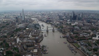 AX114_053E - 5.5K aerial stock footage of the Shard and Tower Bridge over River Thames, Central London England