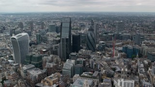 AX114_061 - 5.5K aerial stock footage approach The Gherkin and Central London skyscrapers, England