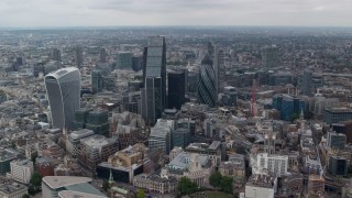 AX114_061E - 5.5K aerial stock footage fly between The Gherkin and Leadenhall Building skyscrapers, Central London, England