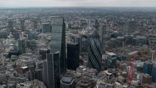 AX114_062 - 5.5K aerial stock footage of The Gherkin and Leadenhall Building skyscrapers, Central London, England