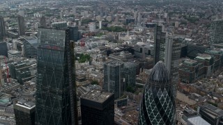 AX114_063 - 5.5K stock footage aerial video fly between The Gherkin and Leadenhall Building skyscrapers, Central London, England
