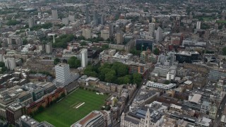 AX114_065 - 5.5K aerial stock footage fly over Artillery Ground cricket field and office buildings, Central London, England