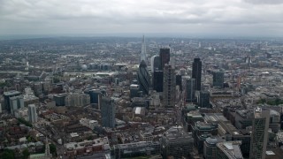 AX114_070 - 5.5K aerial stock footage approach tall skyscrapers and The Shard, Central London, England