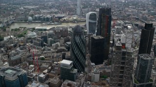 AX114_073 - 5.5K aerial stock footage of an approach to The Gherkin skyscraper, Central London, England