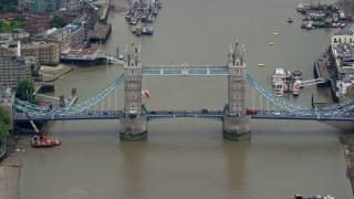 AX114_082 - 5.5K aerial stock footage of the Tower Bridge spanning the River Thames, London, England