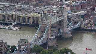 AX114_087E - 5.5K aerial stock footage of the famous Tower Bridge, London, England