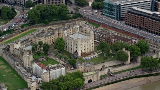 AX114_100 - 5.5K aerial stock footage of flying by the iconic Tower of London, England