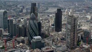AX114_107 - 5.5K aerial stock footage of orbiting The Gherkin and Heron Tower skyscrapers, Central London, England